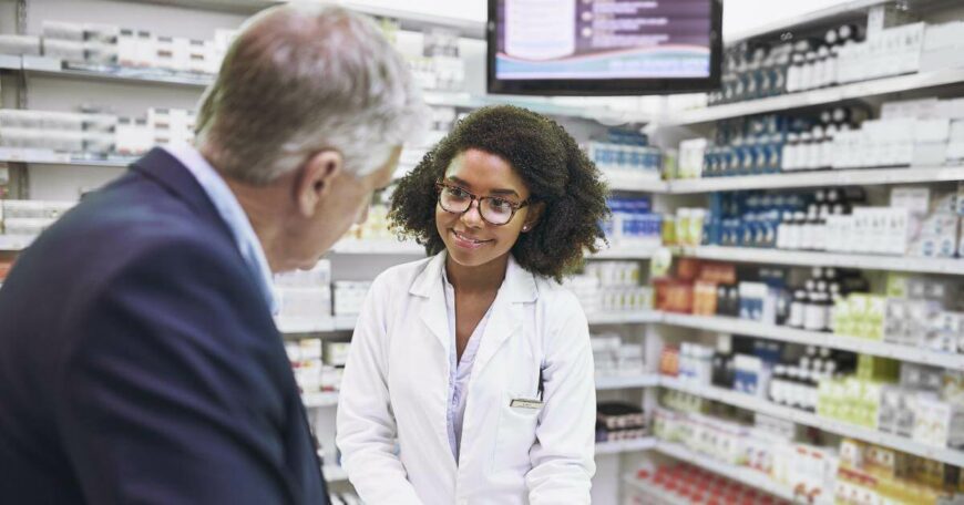 female pharmacist assisting customer
